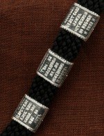 Браслет из серебра 960 пробы и золота 585 пробы c шёлковым шнурком