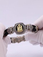 Браслет из серебра 925 пробы и золота 750 пробы c ониксом и шёлковым шнурком